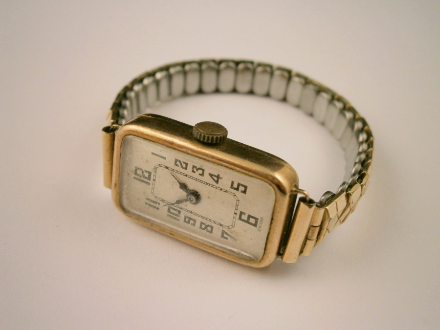 A ladies wrist watch, watch head marked 9ct gold, 19.7g all in