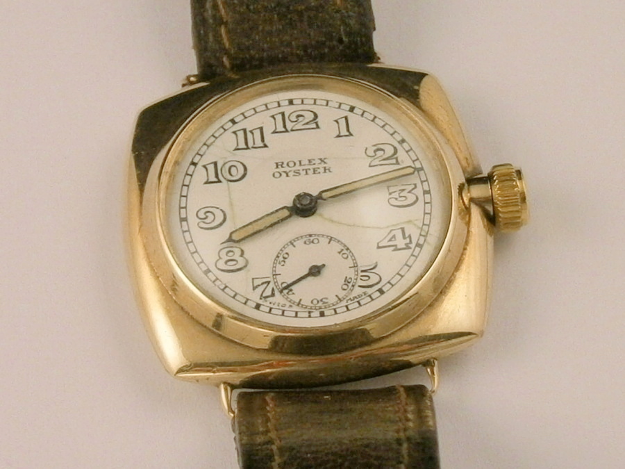 A Rolex Oyster gentleman`s wrist watch, with enamel and secondary dial, yellow metal unmarked,