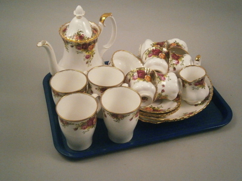 A Royal Albert Old Country Rose part tea and coffee service, to include four coffee cans, six tea