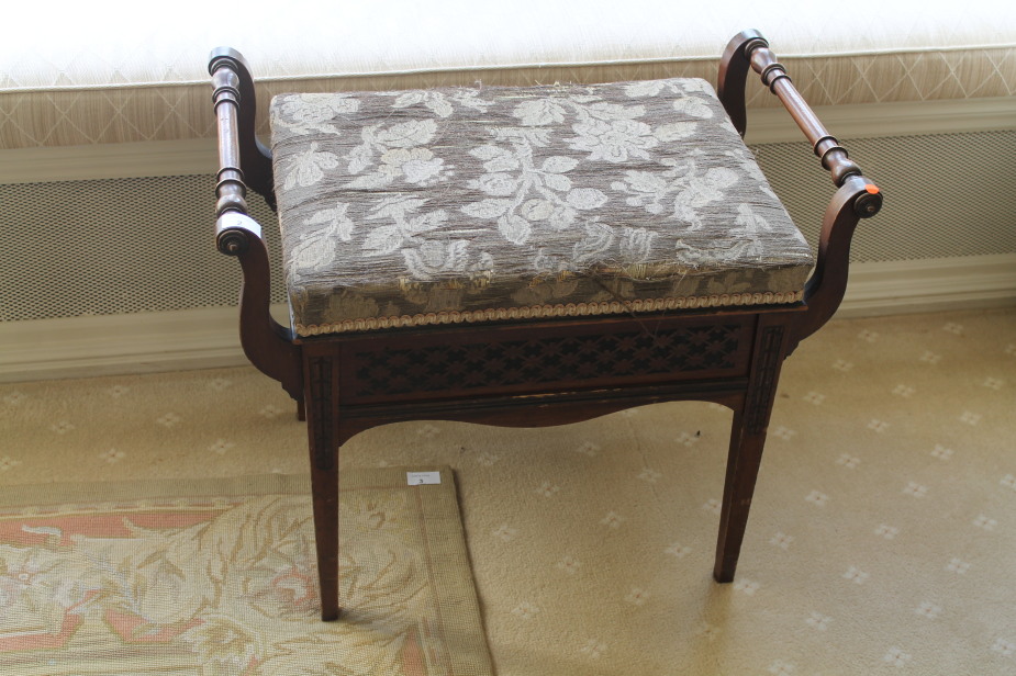 A late Victorian mahogany piano stool, with box seat.