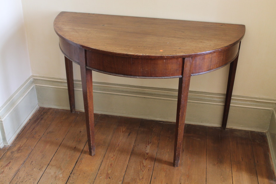 A composite pair of George III mahogany table D ends, 112cm wide, 59cm deep.