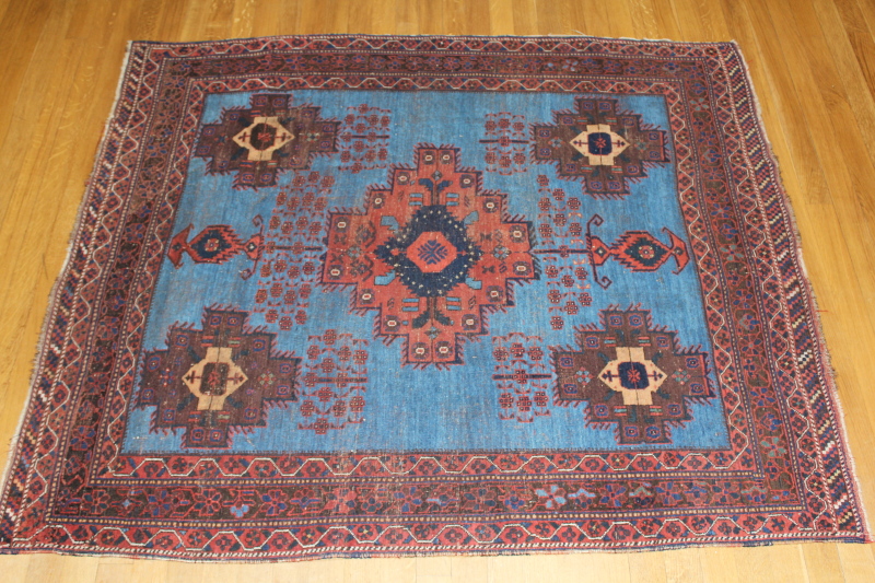 A Afsha bordered rug, 180cm x 155cm