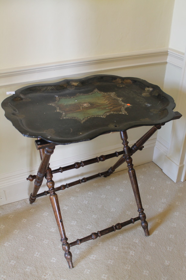 A Victorian papier mâché serving tray, with painted landscape centre, with mother-of-pearl inlay and