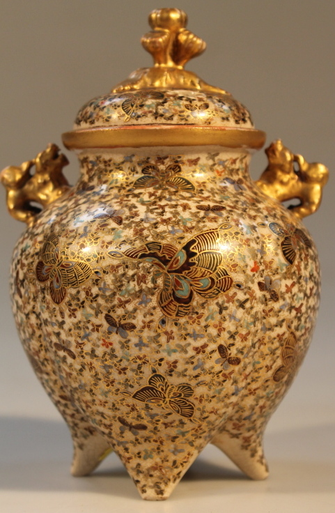 A Japanese Satsuma koro, decorated with butterflies, painted mark to base, 16cm high.