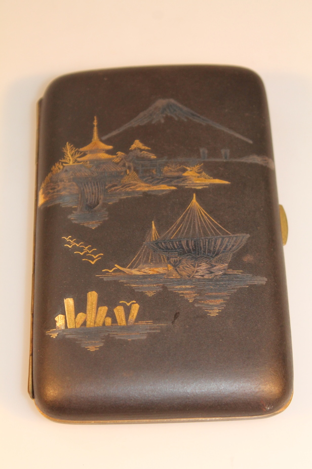 A Japanese Komei style rectangular cigarette case, decorated with Mount Fuji and fishing boats, 14cm