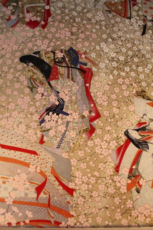 Three decorative 20thC Japanese paintings, one depicting cranes, the other with a ceremonial