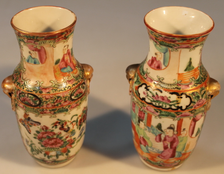 A pair of Chinese Canton small baluster vases, 16cm high.