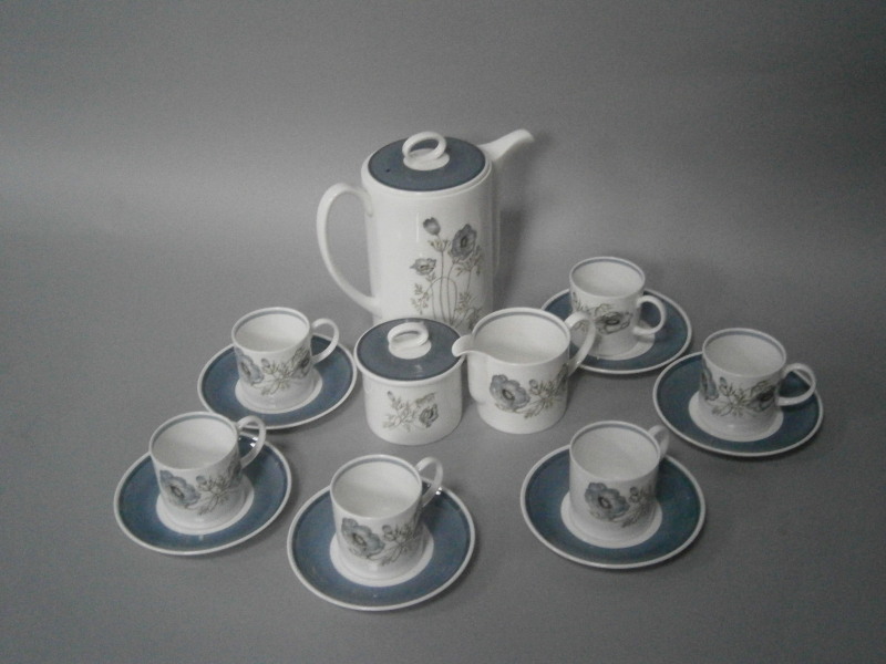 A Susie Cooper Glen Mist coffee set, comprising of a coffee pot, six coffee cans and saucers,