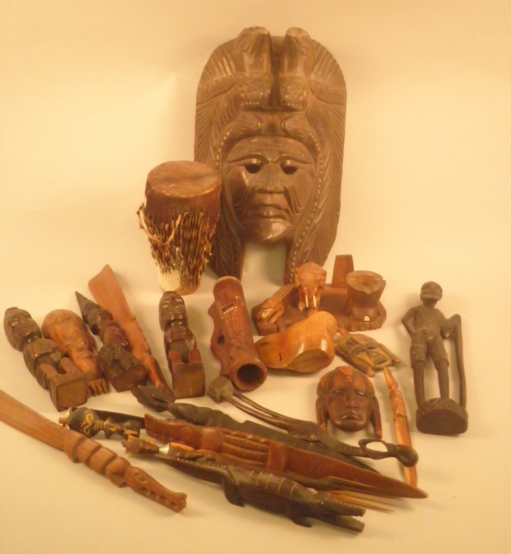 Tribal Art. An African type drum, various carvings, etc, and a Native American type mask.