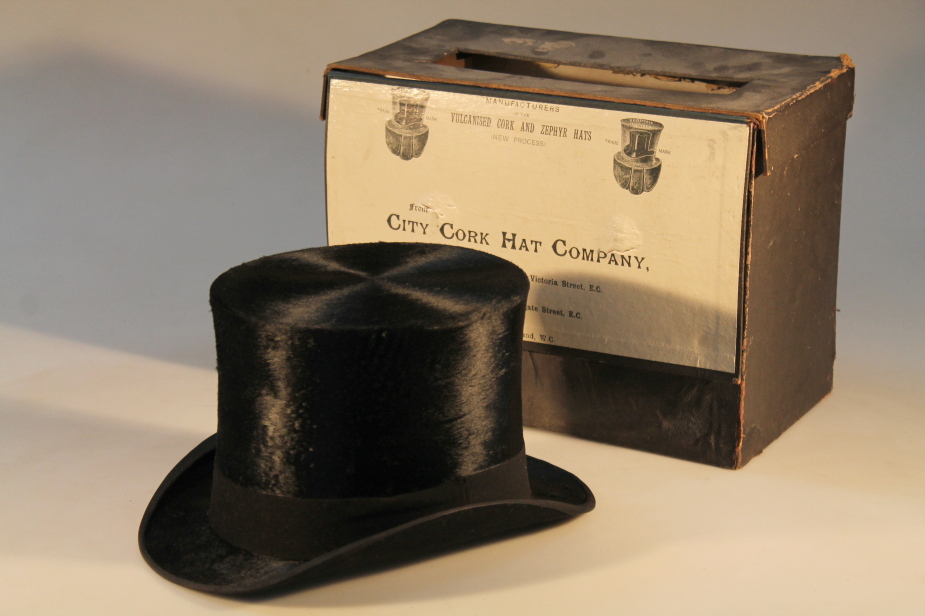 A black silk top hat, manufactured by the Cork Hat Company, London, inside measurement 20.5cm, in