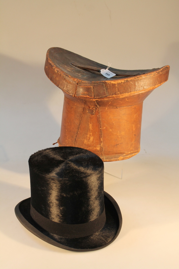 A black silk top hat, manufactured by Tress & Company London, made for Tryner Lynn Grantham,