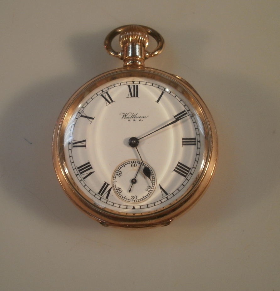 A Waltham USA pocket watch, with bezel wind, enscribed `R.h. Prowse from his Nottingham Post