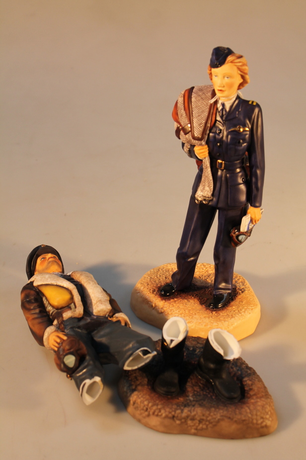 Two Ashmor porcelain figures, one of a female pilot of the Air Transport Auxiliary, 27cm high, and a