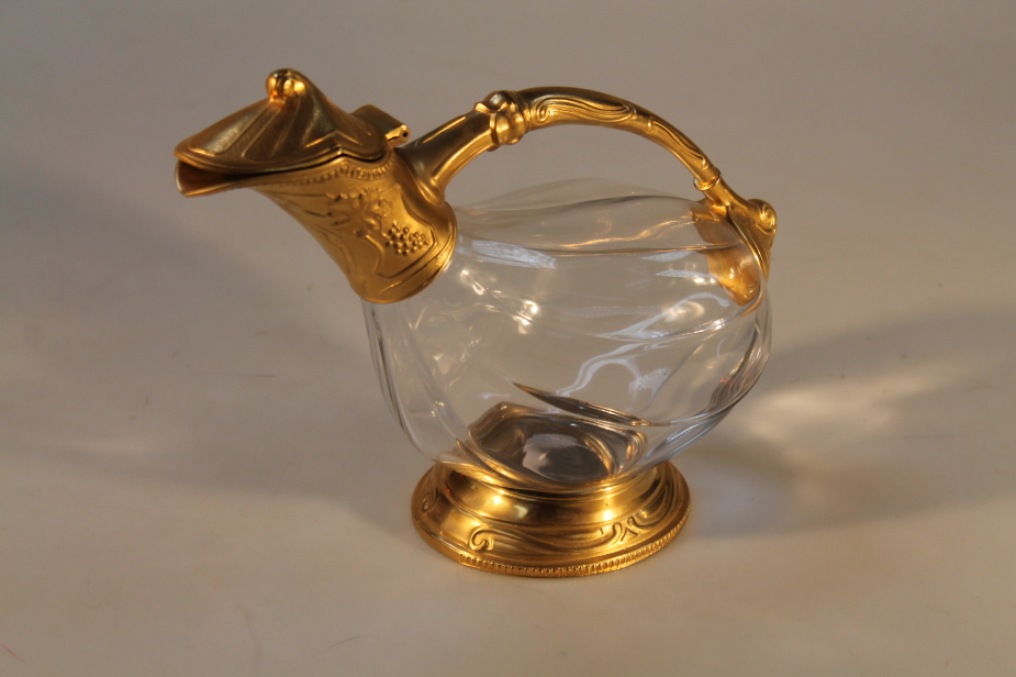 A L`Esprit claret jug, with gilt metal mounts, 20cm high.