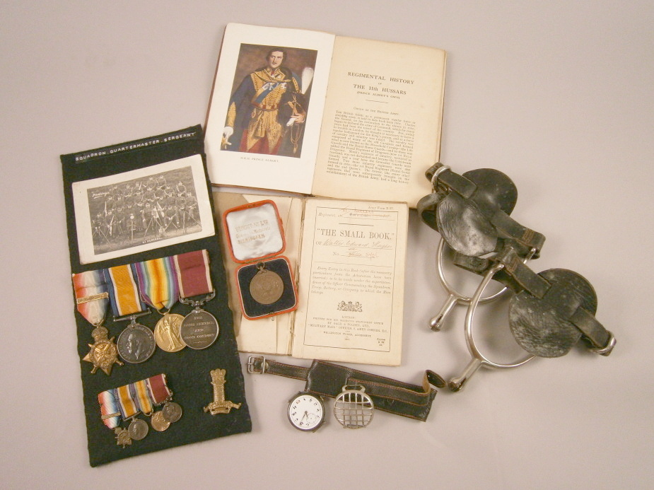 A group of 11th Hussars First World War medals awarded to Walter Edward Hughes, the 1914-18 medal