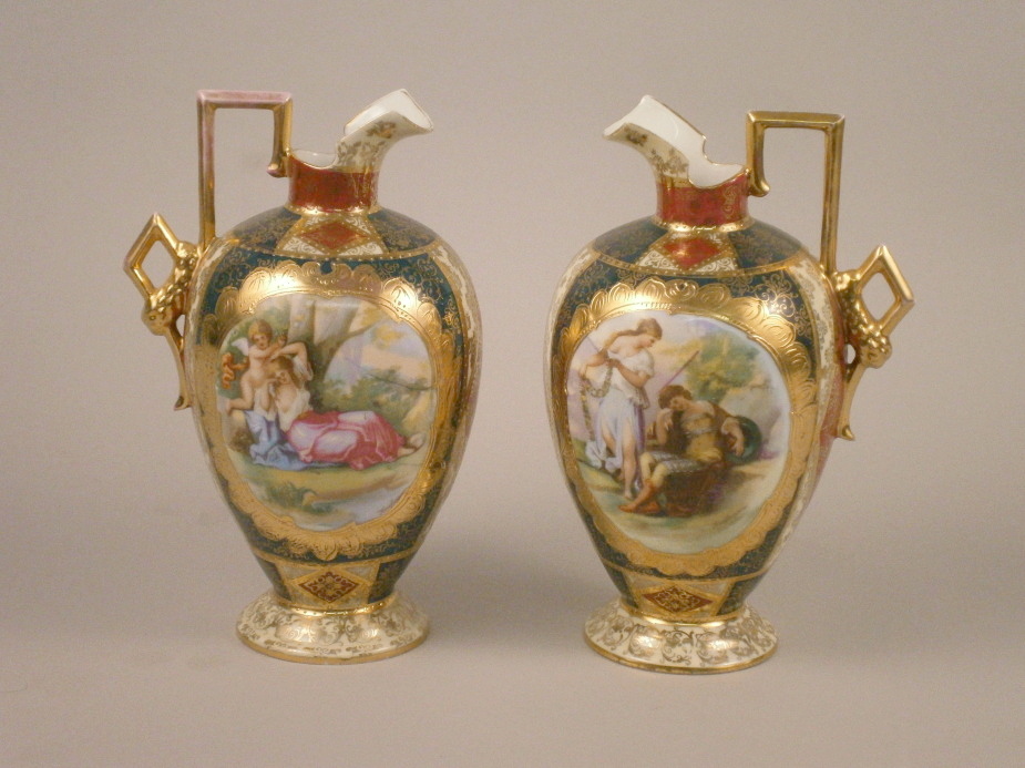 A pair of Continental vases printed with panels after Angelica Kaufmann, picked out in gilt,