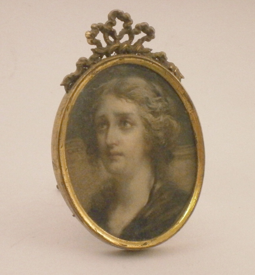 19thC School, portrait miniature of a lady, in oval gilt frame, 9cm high.