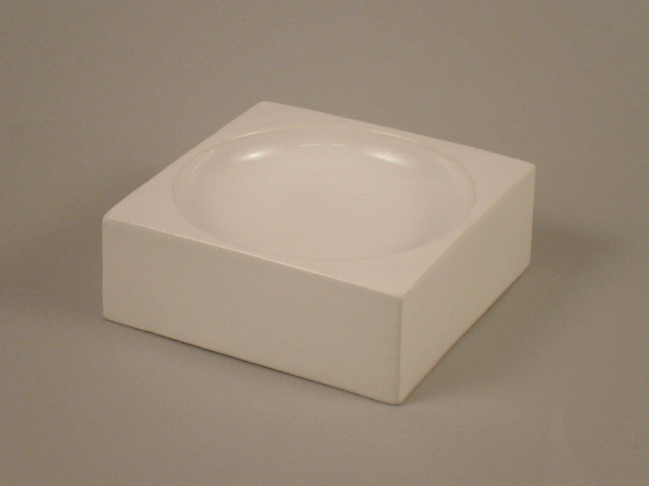 A plain white glazed square Troika ashtray, marked to underside, 12cm wide