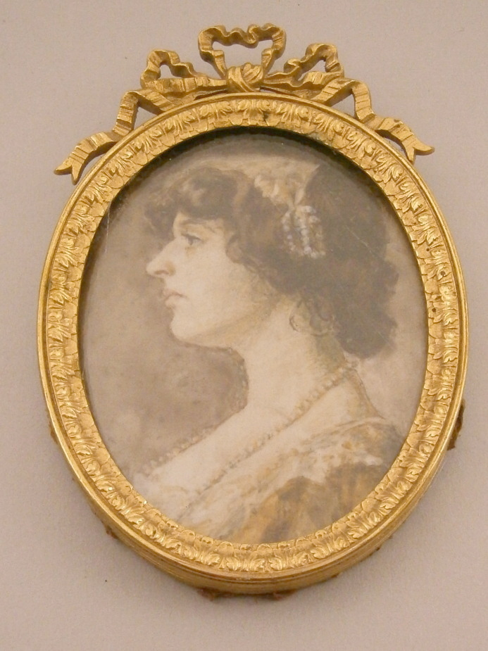 19thC School, portrait miniature of a lady wearing a pearl necklace, in oval gilt metal frame,