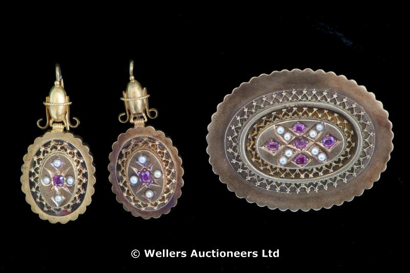 "Victorian seed pearl and ruby locket brooch set in yellow metal, with a pair of matching drop