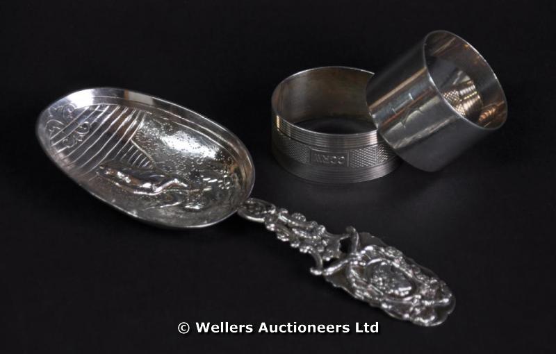 "A 19thC Dutch silver spoon, decorated with seated figure, pierced handle, import marks for London