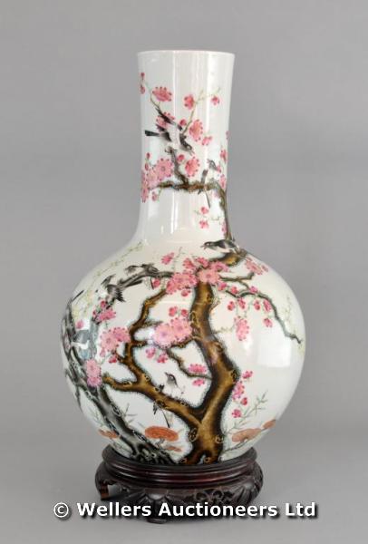 "A large 19thC Chinese bottle vase, decorated with blossom trees and birds, Chien Lung seal mark, on