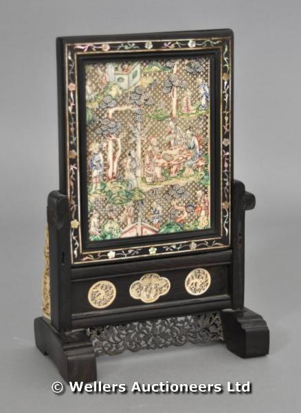 "Chinese hardwood & ivory tablescreen, inset with fretwork panel of figures in landscapes, a looking