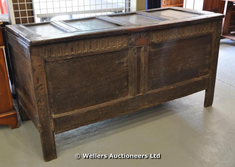 "A large panelled oak chest, carved with dentil frieze, probably 18thC, 140cm long approx. "