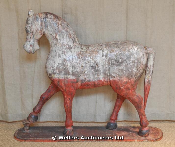"A large bichrome painted wooden horse, Indian or Cypriot, 127cm high "