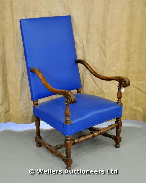 "A 19thC walnut armchair with carved acanthus leaf armrests, turned rail with blue leather seat &