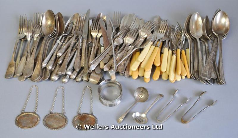 A quantity of silver plated cutlery; and three wine labels