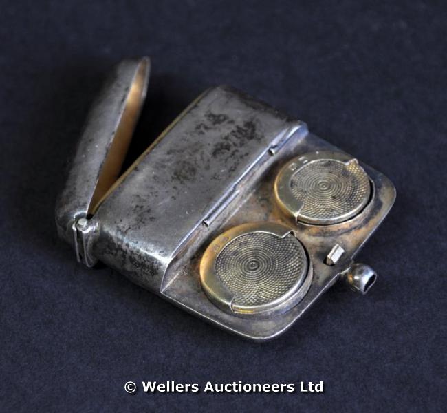 "A silver part vesta/double sovereign case, gilded interior, Birmingham 1911, makers mark JG Ltd,