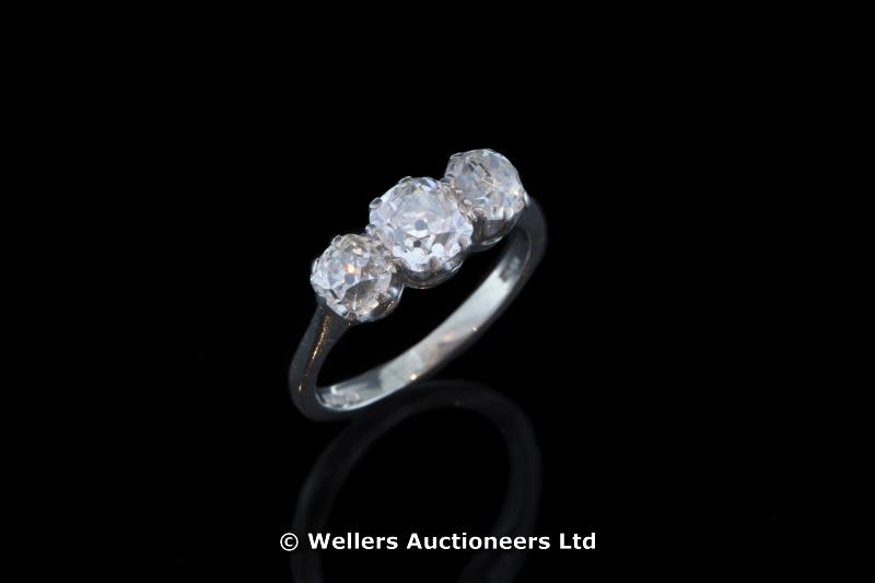 "Three stone diamond ring, old cushion cut diamonds weighing an estimated total of 1.60cts, claw set