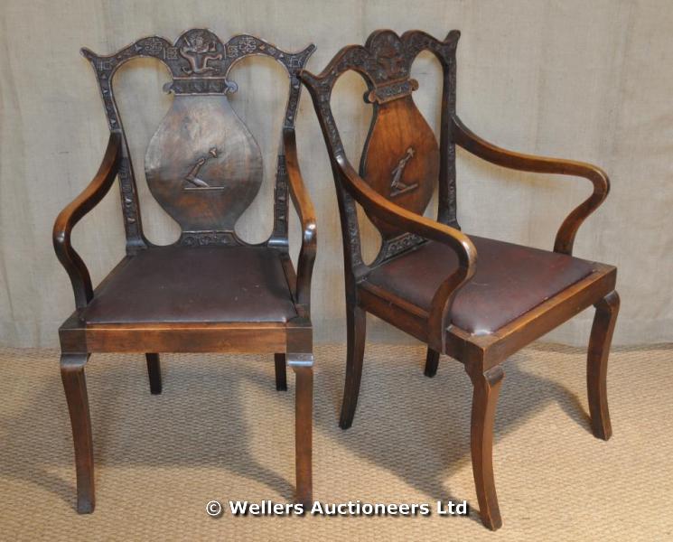 "A pair of Chinese export hardwood chairs, with English crests, 100cm high "