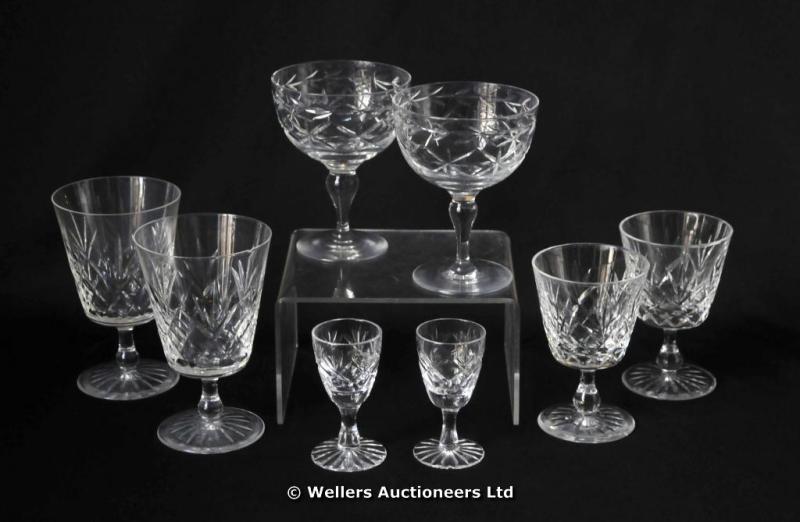 "Cut glass champagne bowls, a pair of Stuart brandy balloons, cut glass wine glasses and sundry