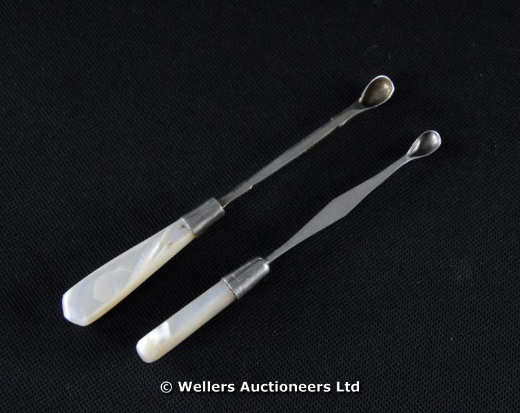 "Two silver snuff spoons, mother of pearl handles, London 1873, makers mark WE, & Birmingham 1859,