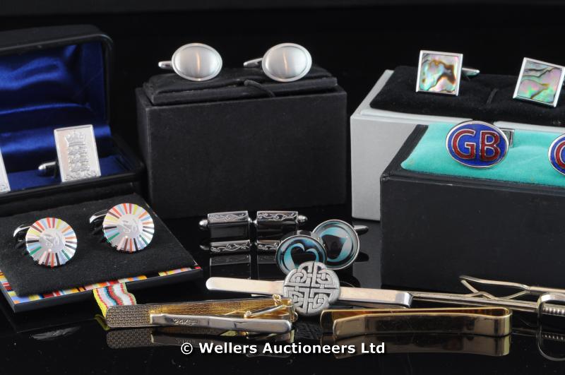 *Bag containing eight pairs of cufflinks and a collection of tie pins (Lot subject to VAT)