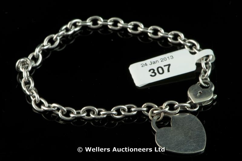 *9ct white gold charm bracelet with a heart padlock clasp and charm (Lot subject to VAT)