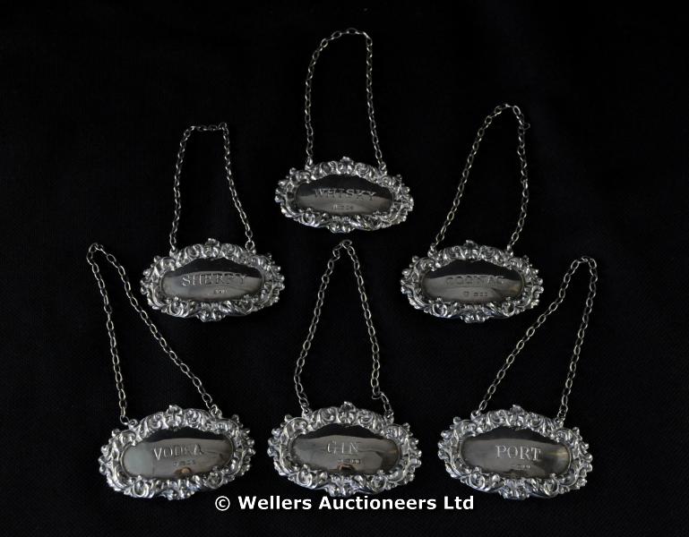 "Six modern silver decanter labels, various dates and makers, 65grs approx."