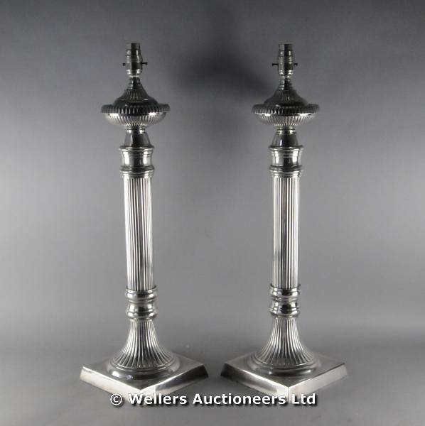 "A pair of silver plated classical column table lamps, 61cm high "