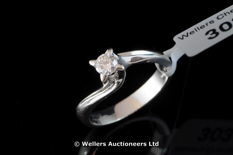 "*Single stone diamond ring, round brilliant cut diamond weighing approximately 0.25ct, crossover