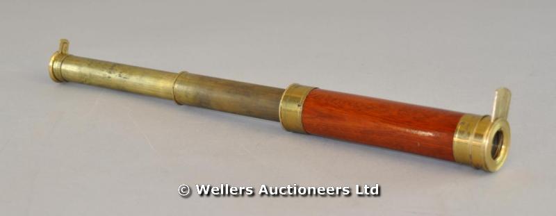 "A 20thC brass and wood telescope, 40cm long"