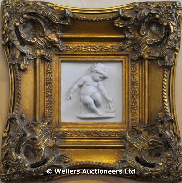 "A gilt framed cherub plaque, 40 x 40cm; and two circular plaques with classical scenes, framed (