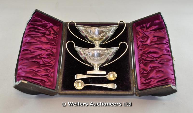 "Cased silver salts, two handled boat form, London 1881, makers mark JA over JS, 160grs approx. "