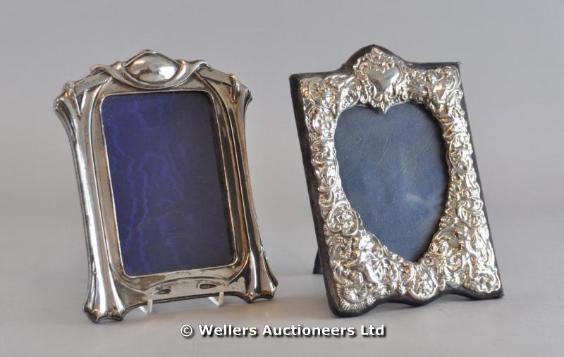 "An Art Nouveau silver photograph frame; and a Victorian style heart form frame, London 1902 &