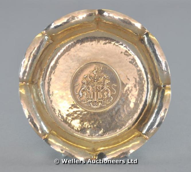 "A German silver petal leaf hammered dish with medallion to centre commemorating a silver wedding