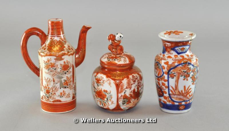 Japanese kutani sake pot; a jar & cover with boy finial; and Imari vase; and a Satsuma teapot (4)