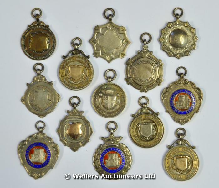 "Eleven silver sporting medallions, for local football 1931-46; and two other medallions, 127grs