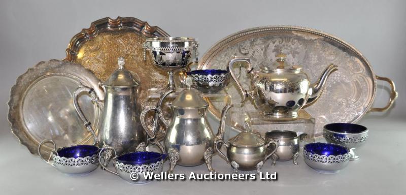 "An early 20thC teapot, bulbous oval body, floral swag & laurel engraving; an oval tray with scallop
