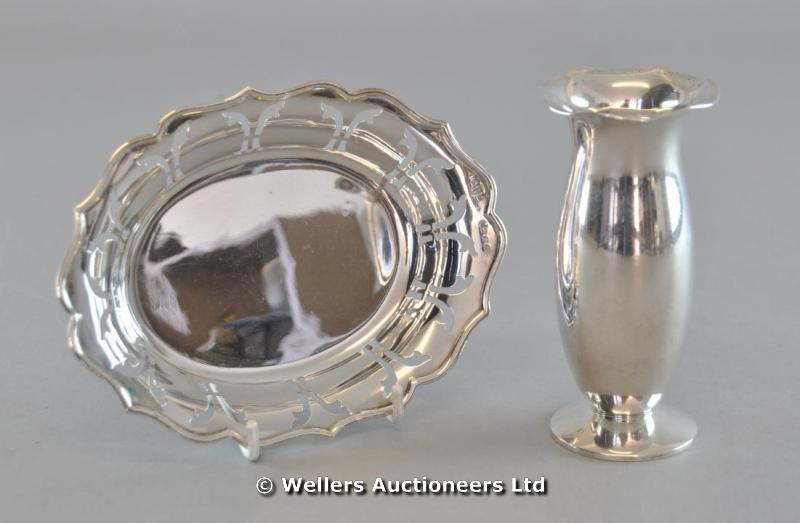 "An 835 standard bud vase, 11cm approx; and a silver oval dish, London 1989"